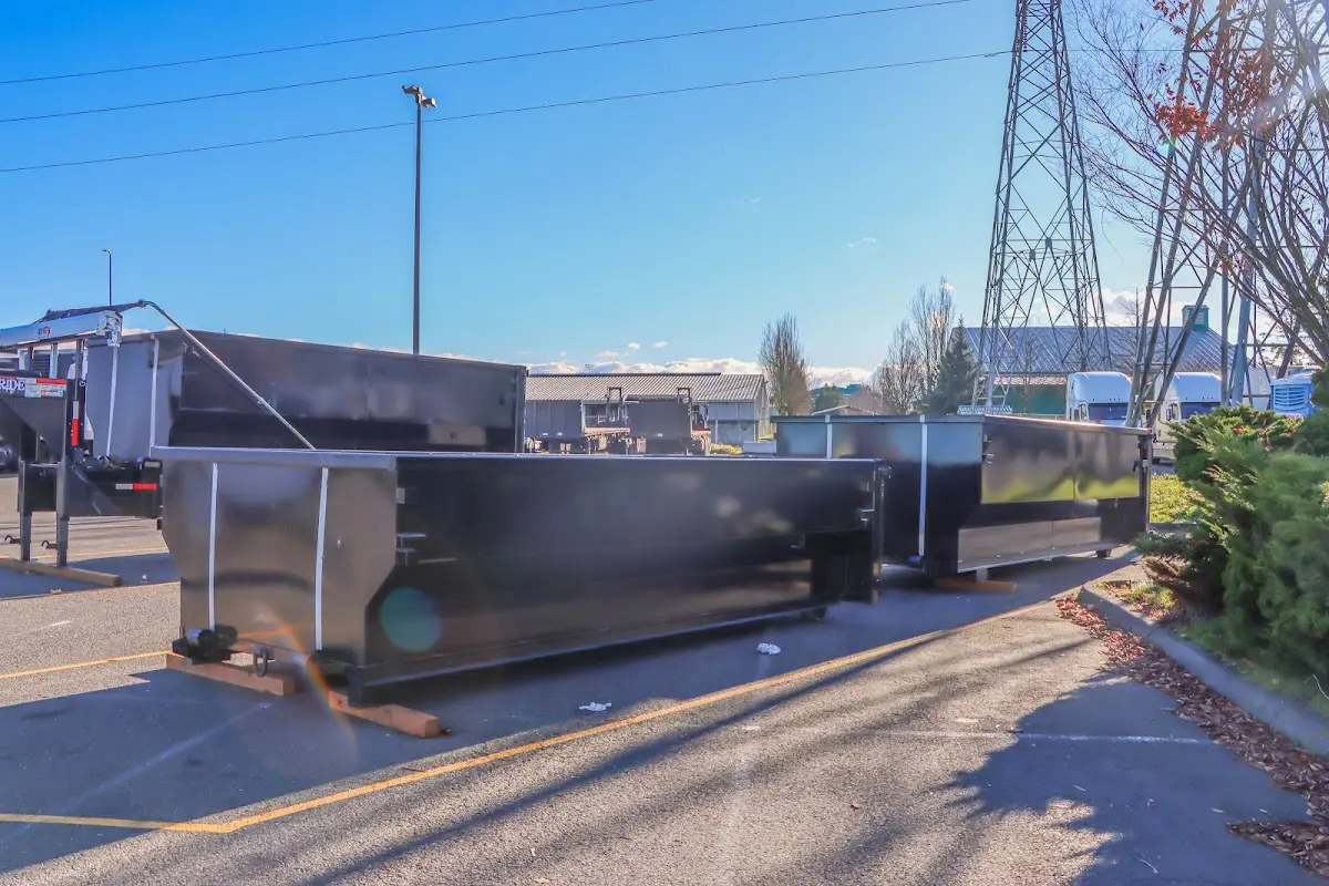 Roll-off dumpster ready for waste disposal at job site for Yard Waste Dumpster Rental in Huntington